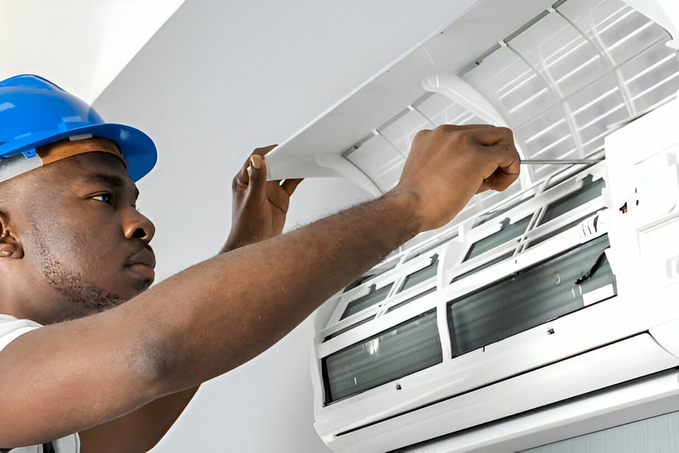 Busta Refrigeration certified technician conducting AC maintenance